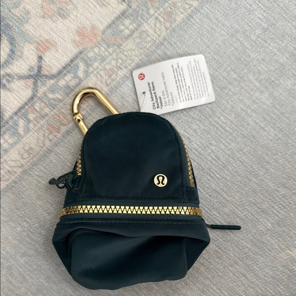 Lululemon Athletica Green and Gold City Adventurer Backpack Keychain